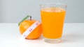 Fresh orange and juice in glass on white background Royalty Free Stock Photo