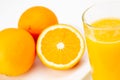 Fresh orange juice and half orange on white background Royalty Free Stock Photo