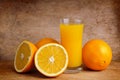 Fresh orange juice and oranges Royalty Free Stock Photo