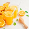 Fresh orange Juice and oranges on the cutting board Royalty Free Stock Photo