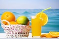 Fresh orange juice, orange slices and oranges in basket against background of surface blue sea. Summer tropical citrus fruits Royalty Free Stock Photo