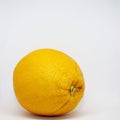 Fresh orange closeup on a white background with place for text Royalty Free Stock Photo