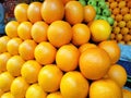 Fresh oranges display on the store,fruits display on the store close up view natural background