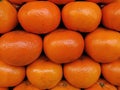 Fresh oranges display on the store, juicey healthy orangs fruits display close up view