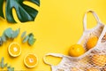 Fresh oranges in a eco bag. Cutted citrus fruit for healthly food. Royalty Free Stock Photo