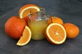 Orange juice and fresh fruits on a table Royalty Free Stock Photo