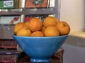 Fresh oranges served in blue plate