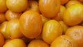 Fresh oranges in supermarket for sale, .pile of orange in market for texture