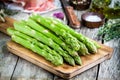 Fresh organic asparagus on a cutting board with Parma ham Royalty Free Stock Photo