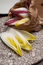 Fresh organic Belgian endivi or green and red chicory lettuce close up Royalty Free Stock Photo