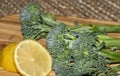 Fresh organic broccoli and a slice of lemon Royalty Free Stock Photo