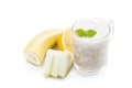 Fresh organic cantaloupe melon and banana smoothie in glass cup isolated on white Royalty Free Stock Photo