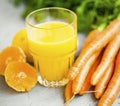 Fresh organic carrot and orange juice glass, healthy lifestyle concept and detox juices Royalty Free Stock Photo