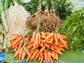 Fresh organic carrots and vegetables for sale in market Royalty Free Stock Photo