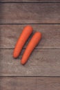Fresh Organic Carrots on wooden table