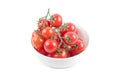 Fresh organic cherry tomatoes bunch on ceramic bowl isolated on white Royalty Free Stock Photo