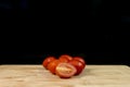 Fresh organic cherry tomatoes on wood Royalty Free Stock Photo