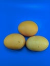 Fresh organic chicken eggs on a blue background Royalty Free Stock Photo