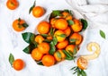 Fresh organic citrus mandarin oranges fruit tangerines, clementines with leaves