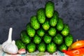 Fresh organic cucumbers, red hot peppers and garlic. Preparing for home pickling. Homemade preserves concept. Closeup Royalty Free Stock Photo