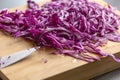 Fresh Organic Cut Slice Red Cabbage CloseUp on Wooden Board - Wholesome and Colorful Delight