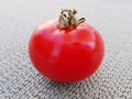 Fresh, organic and delicious tomato on table.