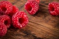 Fresh organic fruit raspberry on wood background Royalty Free Stock Photo