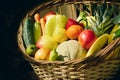 Fresh organic fruit and vegetable in wicker basket close-up Royalty Free Stock Photo