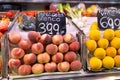 Fresh and organic fruits at farmers market. Red ripe peach for sale. Agriculture and harvesting, food business concept Royalty Free Stock Photo