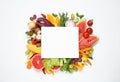 Fresh organic fruits, vegetables and blank card on white background, flat lay. Space for text Royalty Free Stock Photo