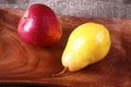 Fresh organic fruits on wooden Serving tray. Assorted pear and apple. Royalty Free Stock Photo