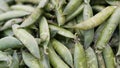 Fresh Organic Green Pods of  Peas in the market Royalty Free Stock Photo