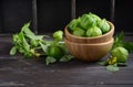 Fresh organic green tomatillos Physalis philadelphica with a husk on rustic wooden table.