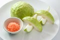 Fresh organic guava fruit and red pepper and salt isolated on a Royalty Free Stock Photo