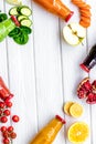 fresh organic juices in bottles for fitness diet on white wooden background top view mock-up Royalty Free Stock Photo