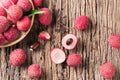 Fresh organic lychee fruit on old wood Royalty Free Stock Photo