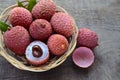 Fresh organic lychee fruits on a rustic wooden background.Exotic tropical litchi berry. Litchee.Raw diet or vegan food concept wit