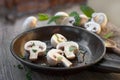 Fresh organic mushrooms fried in a frying pan