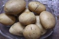 Fresh Organic Potatoes isolated on wood background Royalty Free Stock Photo