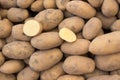 Fresh Organic Potatoes Stack on Market Stall Royalty Free Stock Photo