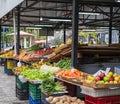 Fresh organic produce on sale at the local farmers market. Counter with fresh vegetables Royalty Free Stock Photo