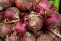 Fresh purple red onion on display at the farmers market. Royalty Free Stock Photo