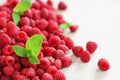 Fresh organic raspberries with mint leaves. Fruit background with copy space. Summer and berries harvest concept. Vegan Royalty Free Stock Photo