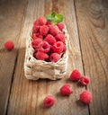 Fresh organic raspberry in basket. Royalty Free Stock Photo