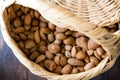 Fresh Organic Raw Almonds with Shell in Basket. Royalty Free Stock Photo