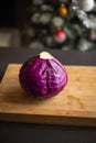 Fresh Organic Red Cabbage Close Up on Wooden Board - Vibrant and Nutrient-Rich Beauty