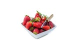 Fresh organic red strawberries in a ceramic bowl on white background Royalty Free Stock Photo