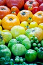 Fresh organic red, yellow and green tomatoes rainbow background Royalty Free Stock Photo