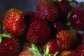 Closeup of big ripe red strawberry berries in a bowl