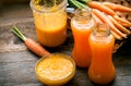 Fresh organic smoothie and ripe carrot juice